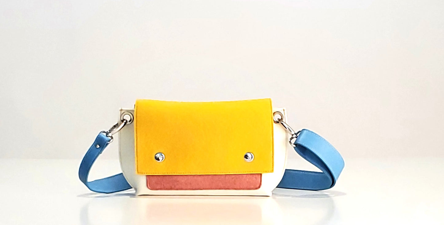 GREGOR Yellow Multi-Color Belt Bag: Light, compact, and surprisingly spacious. Features include two external pockets for large phones, a smaller internal pocket, and a versatile adjustable strap. Made from durable 3mm Merino wool felt and eco-friendly vegan leather. Closure with flap and magnetic buttons. Handmade in Italy. - Lefrac