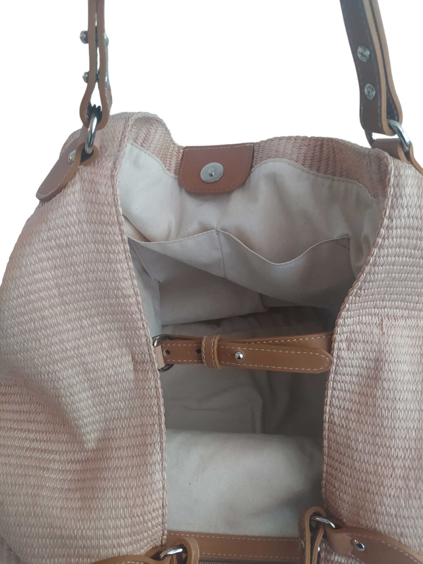 Beige Margot bag: large, soft, and lightweight, crafted from cotton with a raffia-like texture. Features vintage-style vegan leather handles, 3 large pockets (one zippered), internal magnetic button, and a leather lace with carabiner for adjustable shape. Measures 36cm H x 36-56cm W x 25cm D. Comes with a dust bag and tracking. Vegan leather is 69% organic materials.- Lefrac