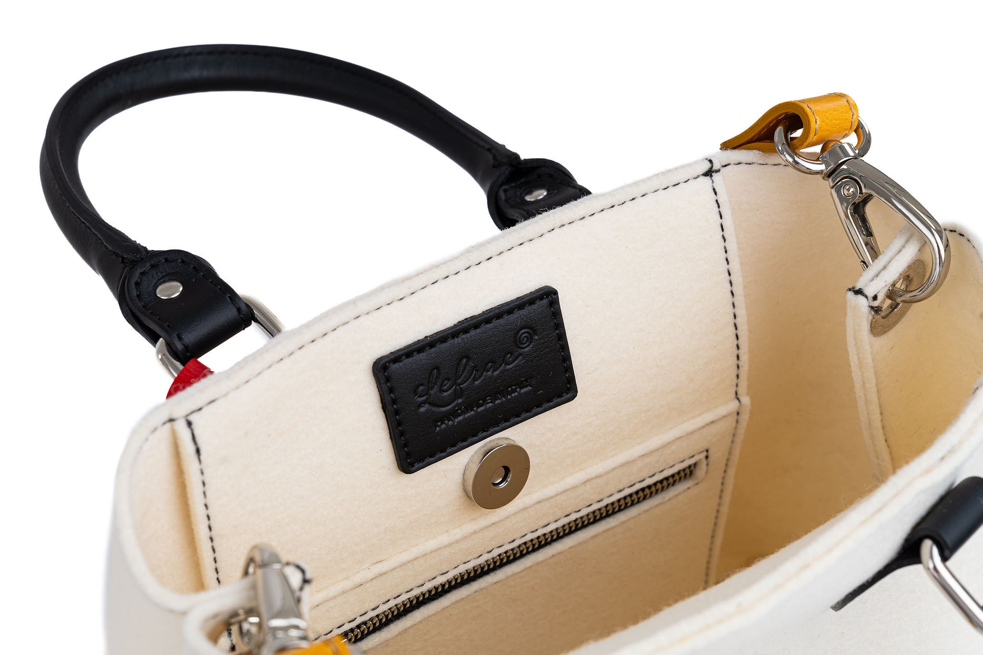 EMMA Red Multi-Color Mini Handbag made from sustainable merino wool felt and eco-friendly vegan leather. Features a vintage-inspired design with a unique worn look, showcasing durability, water resistance, and a blend of vibrant colors. Ideal for a stylish and eco-conscious accessory. - Lefrac