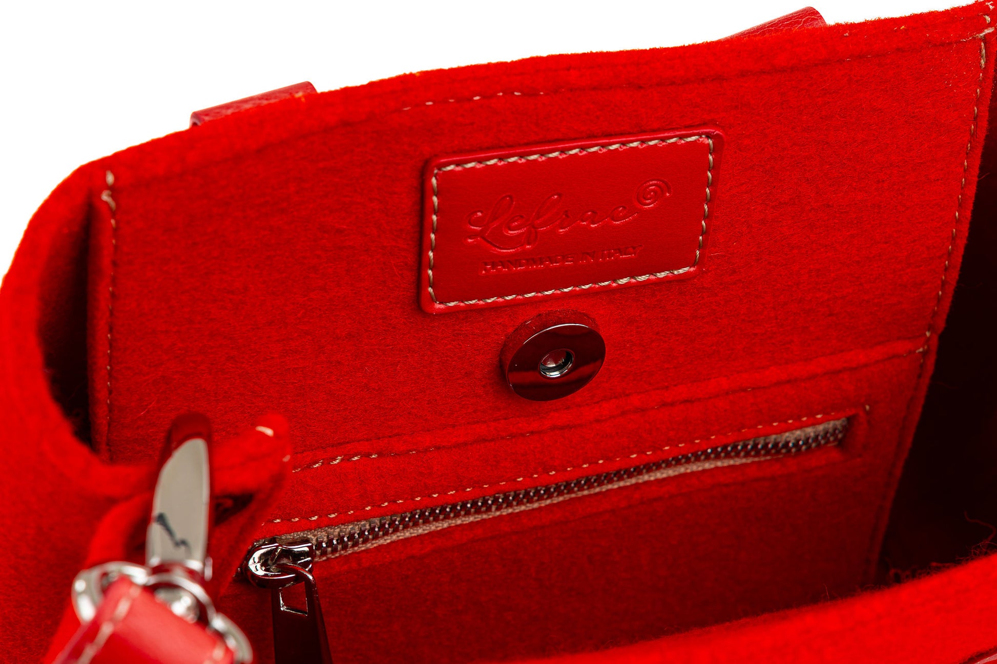 EMMA RED MINI bag, date night size, made of durable 3mm Merino wool felt with vegan leather handles, detachable strap, and 2 roomy pockets. Features a magnetic button closure and vintage style. Handmade in Italy. Sustainable, biodegradable, and eco-friendly materials. Ideal for carrying essentials securely. - Lefrac