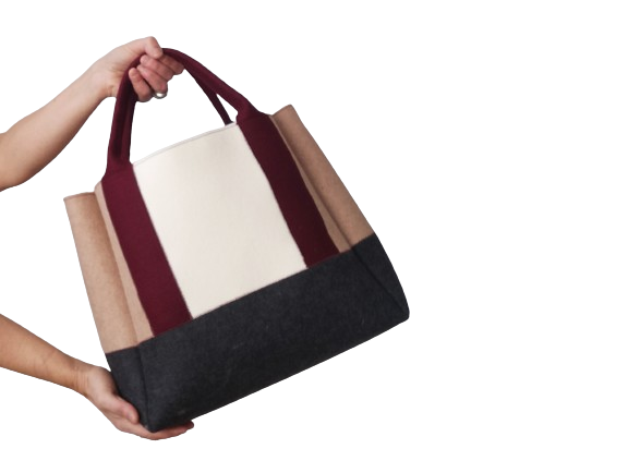 Diane Bag,in color blocks, is a large bag with a particular cloud shape which gives it a wide internal space and an attractive design. Equipped with two large pockets and can be carried by hand, over the shoulder and across the body, 3mm Merino Wool Felt.  Detachable Vegan leather strap made from organic materials, 2 inside pockets. Two internal magnetic buttons allow you to keep your essentials safe. -Lefrac