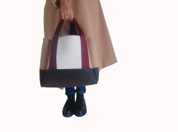 Diane Bag,in color blocks, is a large bag with a particular cloud shape which gives it a wide internal space and an attractive design. Equipped with two large pockets and can be carried by hand, over the shoulder and across the body, 3mm Merino Wool Felt.  Detachable Vegan leather strap made from organic materials, 2 inside pockets. Two internal magnetic buttons allow you to keep your essentials safe. -Lefrac