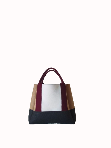 Diane Bag,in color blocks, is a large bag with a particular cloud shape which gives it a wide internal space and an attractive design. Equipped with two large pockets and can be carried by hand, over the shoulder and across the body, 3mm Merino Wool Felt.  Detachable Vegan leather strap made from organic materials, 2 inside pockets. Two internal magnetic buttons allow you to keep your essentials safe. -Lefrac