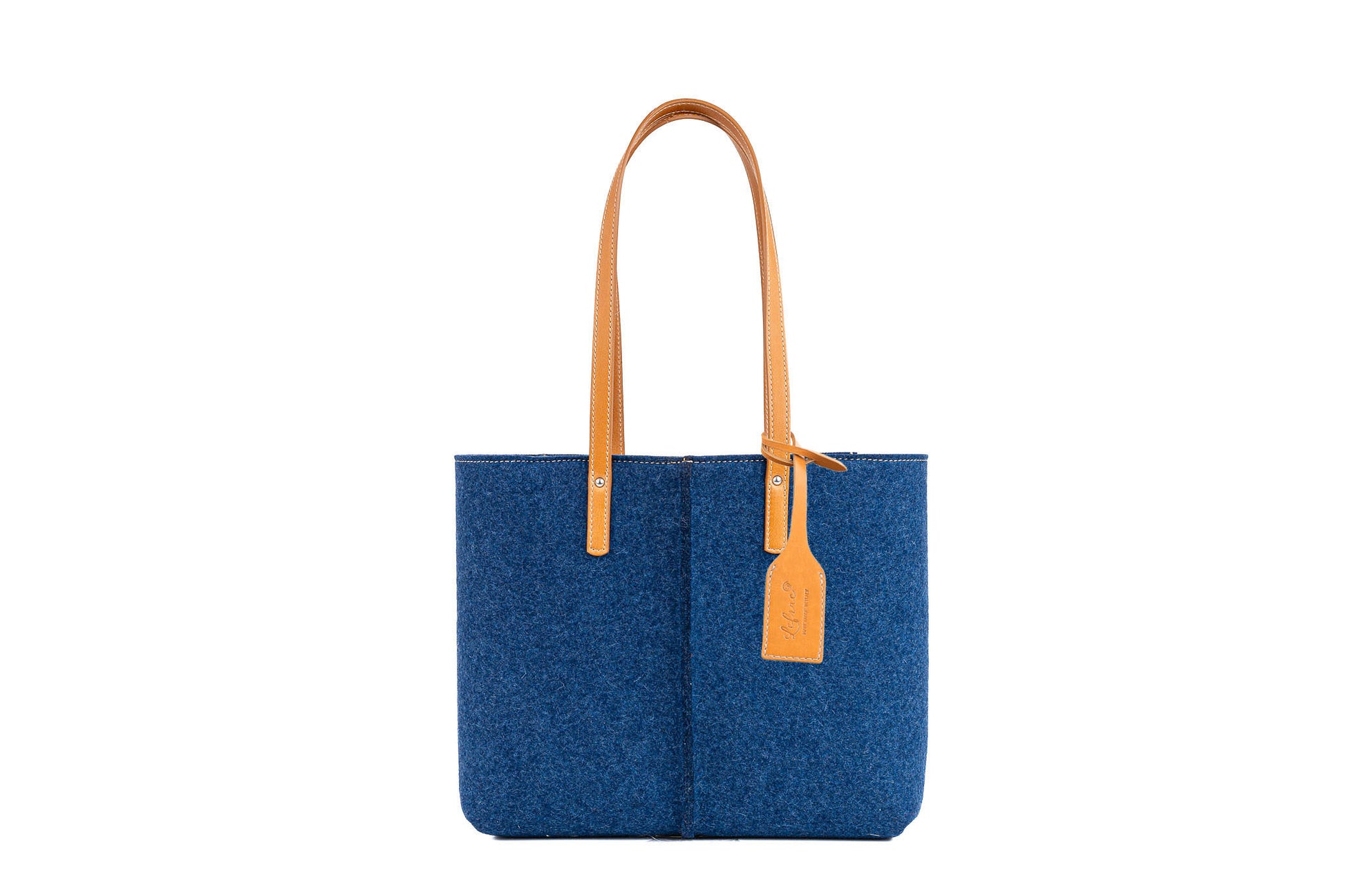 Tote Bag Medium Blue in 3mm Merino wool felt with vegan leather. Features 2 inside pockets, magnetic buttons, and a 27 cm handle drop. Handmade in Italy.-Lefrac