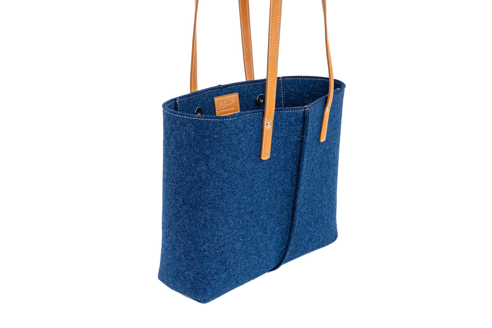 Tote Bag Medium Blue in 3mm Merino wool felt with vegan leather. Features 2 inside pockets, magnetic buttons, and a 27 cm handle drop. Handmade in Italy.-Lefrac