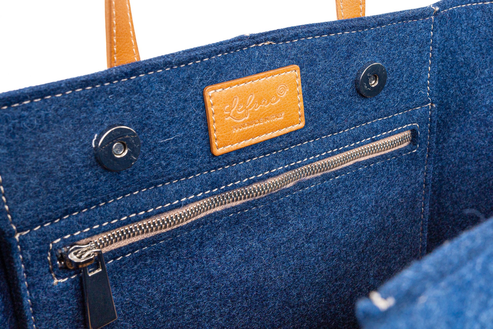 Tote Bag Medium Blue in 3mm Merino wool felt with vegan leather. Features 2 inside pockets, magnetic buttons, and a 27 cm handle drop. Handmade in Italy.-Lefrac