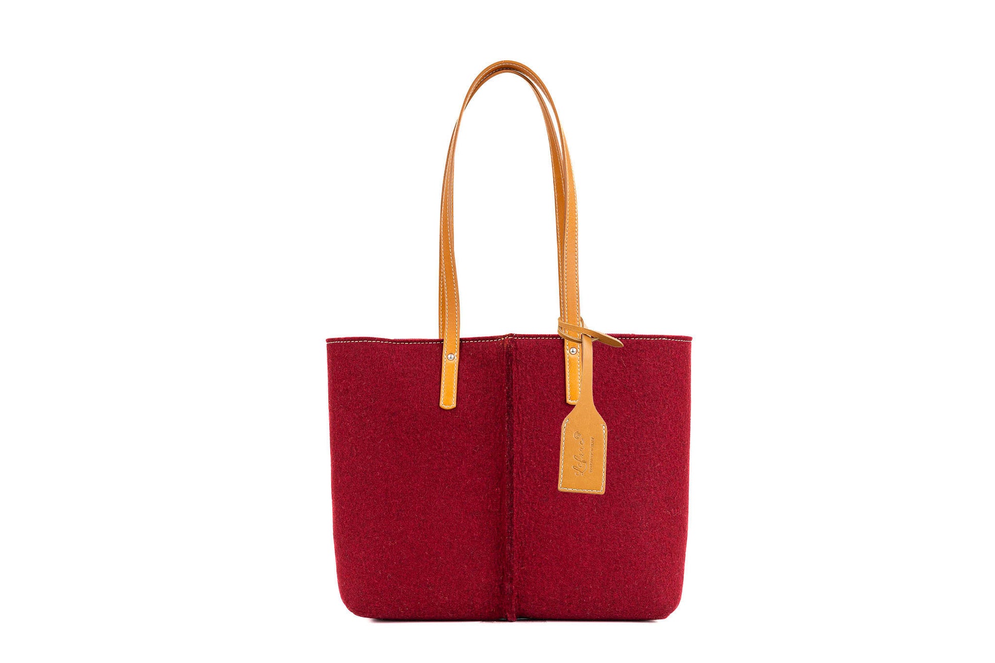 Tote Bag Medium Bordeaux in Merino wool felt with vegan leather. Features 2 internal pockets, magnetic buttons, and a 27 cm handle drop. Handmade in Italy.-Lefrac