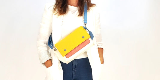 GREGOR Yellow Multi-Color Belt Bag: Light, compact, and surprisingly spacious. Features include two external pockets for large phones, a smaller internal pocket, and a versatile adjustable strap. Made from durable 3mm Merino wool felt and eco-friendly vegan leather. Closure with flap and magnetic buttons. Handmade in Italy. - Lefrac