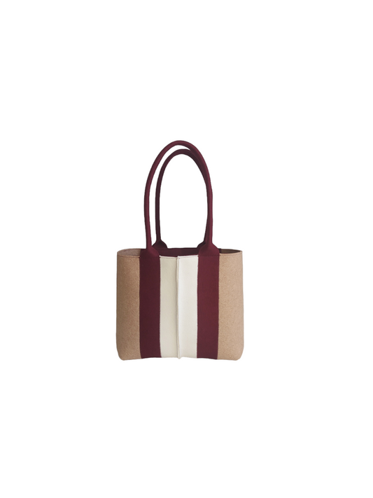 High-quality Merino wool felt tote bag, lighter and sturdier than leather. Features 4 internal pockets, magnetic buttons, and a spacious design. Handmade in Italy. Available in Camel, Bordeaux, and White.-Lefrac
